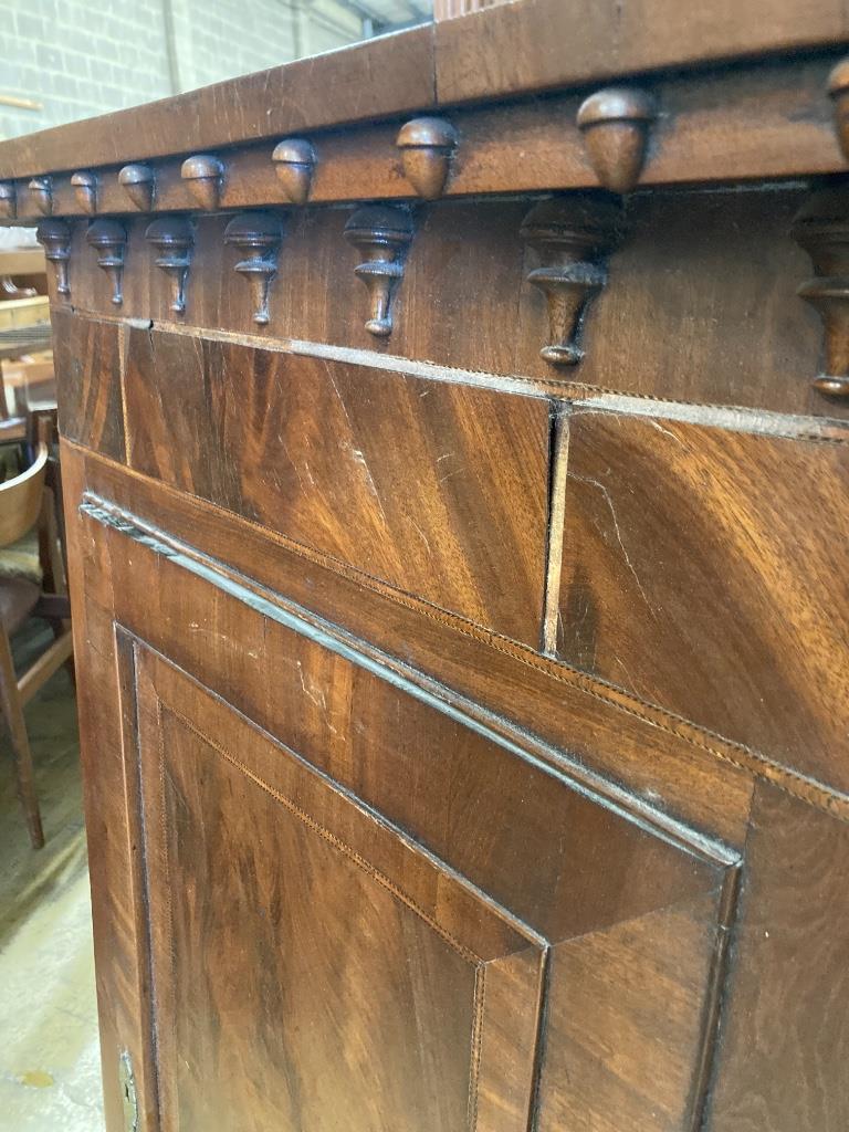 A George III mahogany hanging corner cupboard, width 84cm, depth 43cm, height 121cm